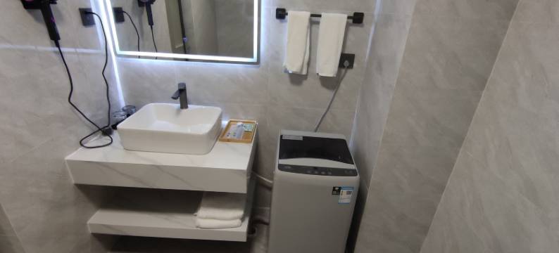 喜遇酒店公寓(天奕国际广场中山站店)图片