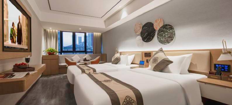 咖曼酒店(万象城六沟垅地铁站店)图片