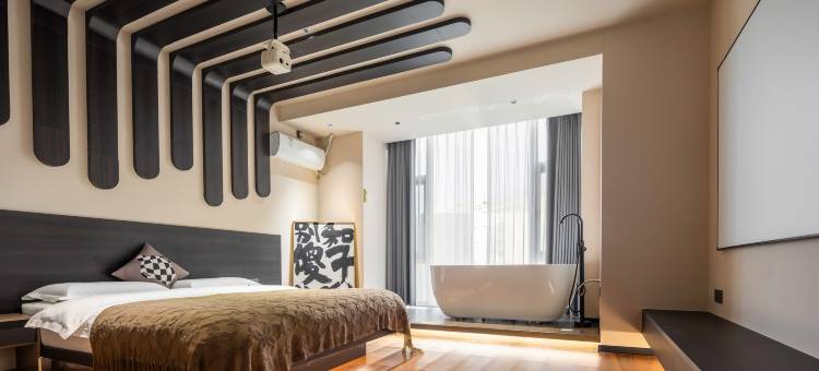 缘宿·设计师投影民宿(大同东信广场店)图片