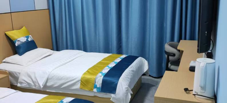 酒泉红彤彤宾馆(钟鼓楼汉唐美食街店)图片