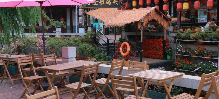 弥勒喜乐院酒店(湖泉水乡旅游度假区店)图片