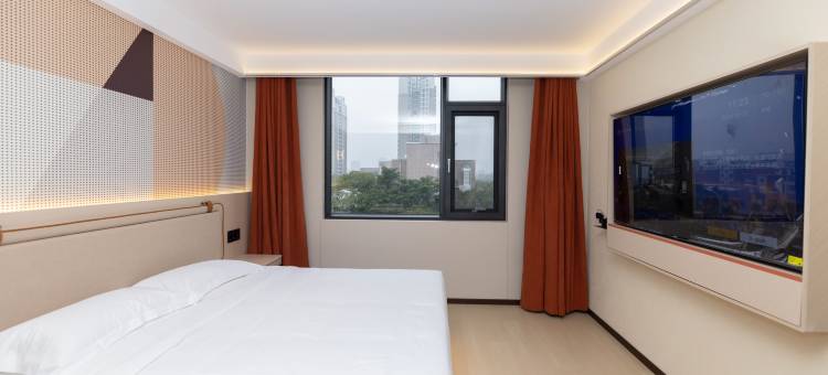 橙子酒店(东营石油大学万达广场西城店)图片