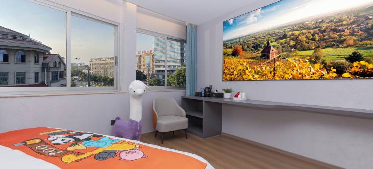 黔花之筑EconomyBusinessHotel兴业酒店(诏安关帝庙梅峰公园店)图片