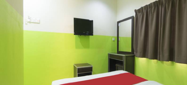 迈恩斯瑟姆帕卡酒店(Mines Cempaka Budget Hotel)图片