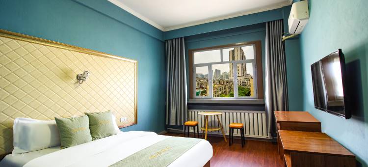 布丁严选酒店(库尔勒火车站出站口店)图片