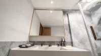 Yuexi A'xia Manor Hotel - Bãi đậu xe