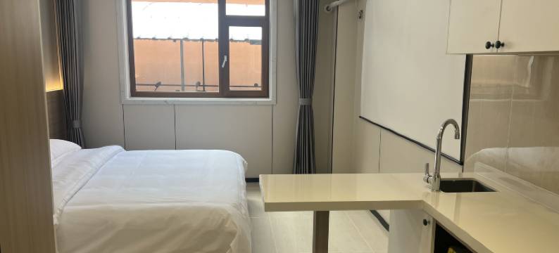 东丰柒朵宾馆(中医院店)图片