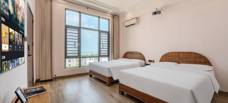 徐闻县誉海澜湾·风车长廊观日瞰海美宿(南极村店)图片