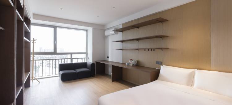 城家高级公寓(上海宝杨路地铁站店)图片