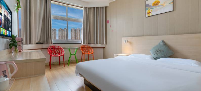 新港商务宾馆(信阳火车站天润广场店)图片