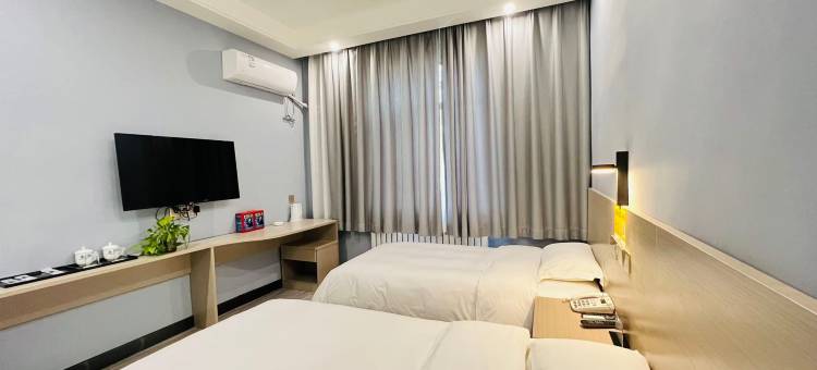 喜悦石榴酒店(财经大学体育中心店)图片