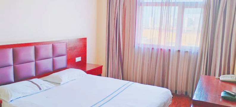 乌鲁木齐第1站主题宾馆(新疆职业大学喀什路校区粮校市场店)图片