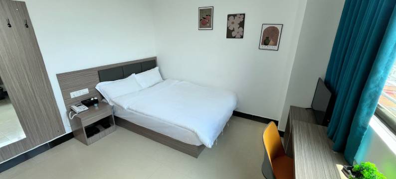 新里程商务酒店(下茆龙湾店)图片