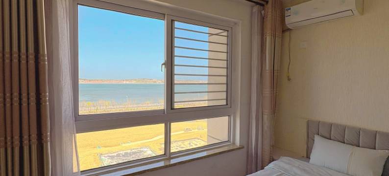 烟台石榴家海景公寓(养马岛店)图片