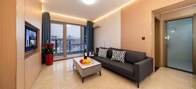 曼朵轻奢智能影音酒店(威海火炬八街国际海水浴场店)图片