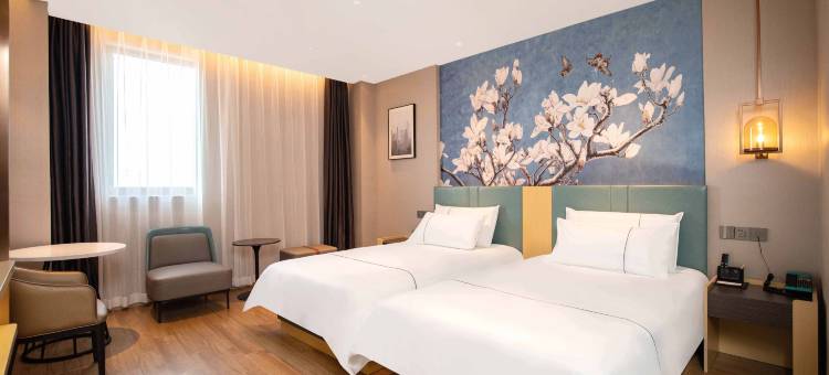 白玉兰酒店(南京江宁金宝湖熟商业广场店)图片