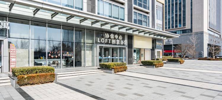 君逸海景酒店公寓(石老人国际会展中心店)图片