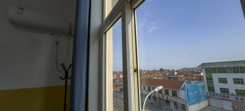 荣成东海岸商务宾馆(成山镇西霞口动物园店)图片