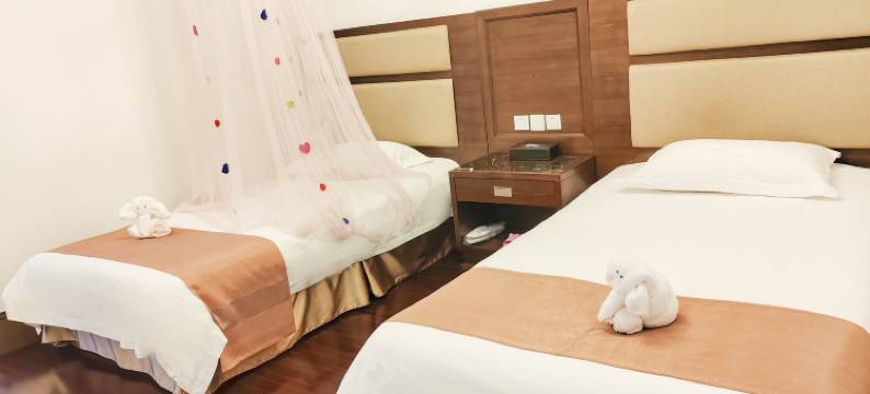 漠河峰悦之约酒店(松苑公园店)图片