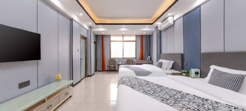 骏龙电影酒店(海口友谊南海城滨濂夜市店)图片