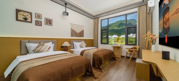 楠华居·Homy山景智能美宿(丽江三义国际机场店)图片