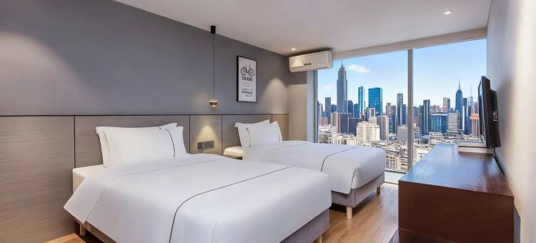 月友连锁酒店(鸳鸯轻轨站店)图片