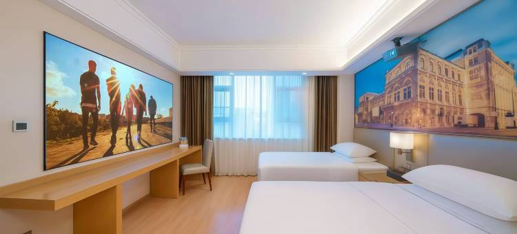 维也纳酒店(平南中心广场店)图片