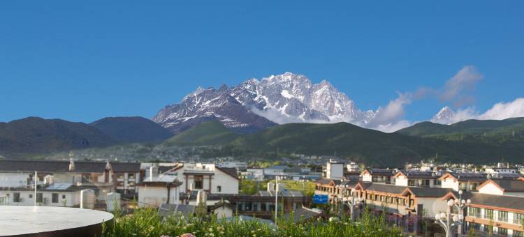 既见山野丨日照金山空中花园雪山观景隐奢度假酒店(丽江古城店)图片