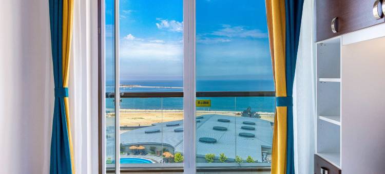 沐海·Homestay海景度假公寓(营口山海广场魔法温泉店)图片