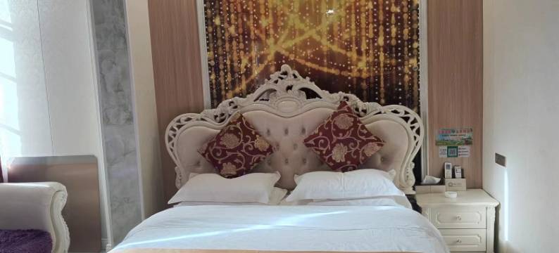 环县银鑫主题酒店图片