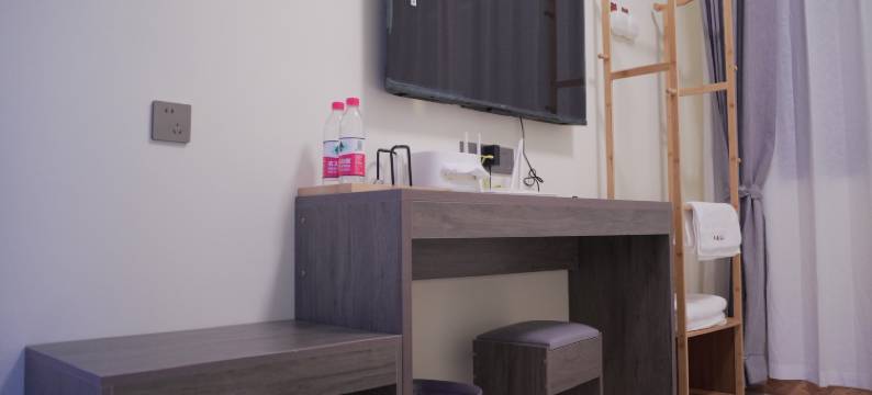 六盘水市钟山区昀扬酒店(凉都体育中心店)图片