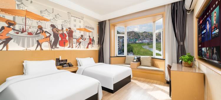 途客轻居酒店(绥德石魂广场千狮桥店)图片