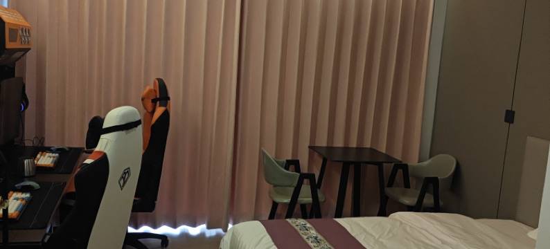 嬉游电竞酒店(保来国际城店)图片