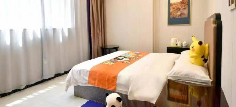 竹溪左岸商务宾馆(武陵不夜城广场公园店)图片