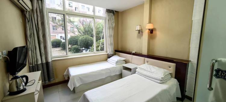 瓦房店名仕宾馆图片