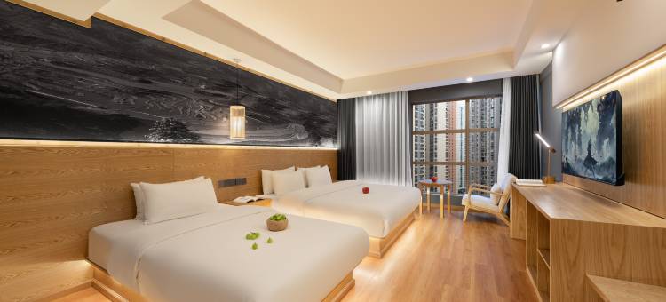 原竹·漫居酒店(花果园双子塔方圆荟海豚广场店)图片