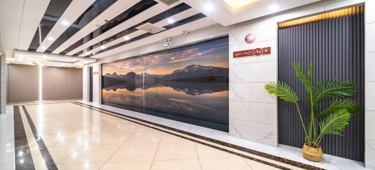 瑞源酒店(西亚和美信阳火车站店)图片