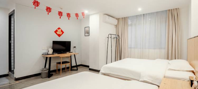 格林客栈(梧州第四中学市政广场店)图片