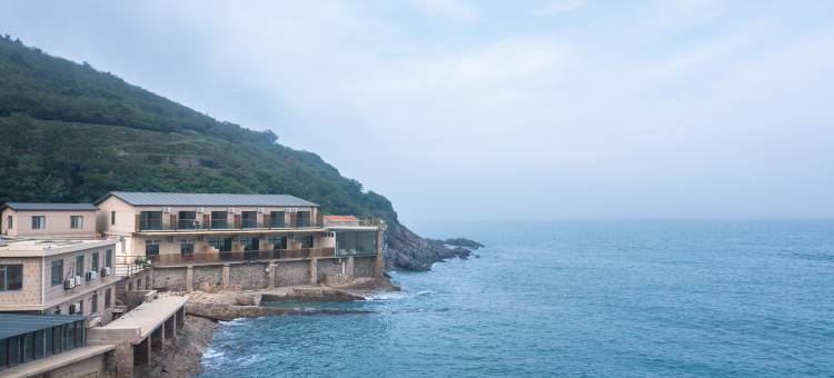 青岛牧风野梦幻海滩海景民宿(崂山风景区店)图片