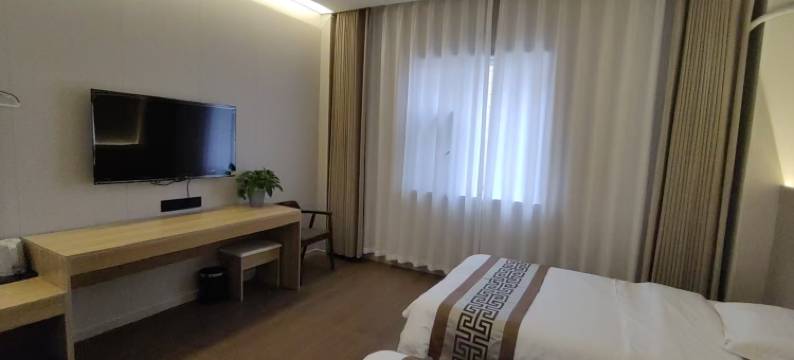 白水溪酒店(吐鲁番托克逊飞马转盘店)图片