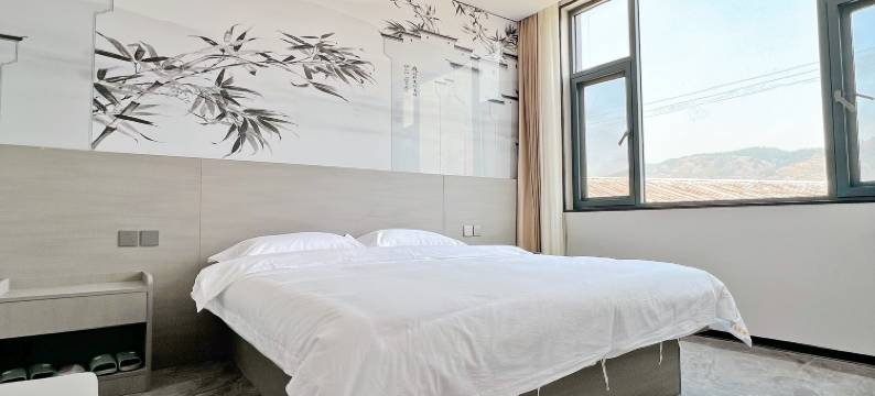 弥勒花园宾馆(竹园镇店)图片
