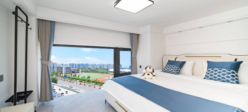 椰子宿下·听蓝·LOFT设计城市艺宿(三亚湾凤凰机场店)图片