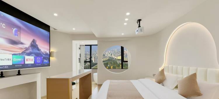 臻悦·影音民宿酒店(广安吾悦广场店)图片