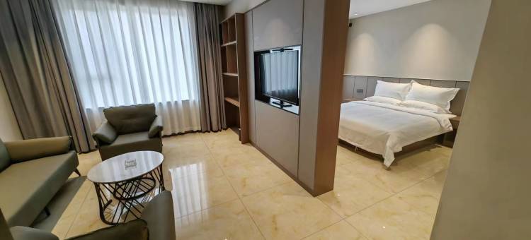 沁水镁乐轻居酒店图片