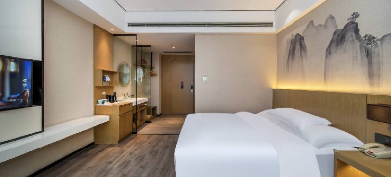 雷际酒店(翡翠湖大学城店)图片