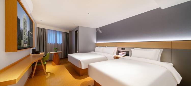 艺龙安云酒店(上海宝山万达广场共康路地铁站店)图片