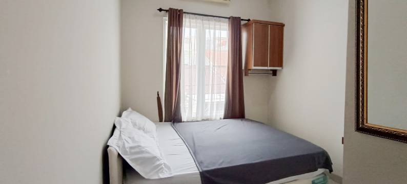 维斯玛阿尔伊曼酒店-由努萨林克管理(Wisma Al Iman Syariah 25 Mitra RedDoorz)图片