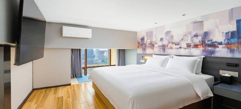 曼陀伦Plus智能酒店(江门和兴广场五邑华侨广场店)图片