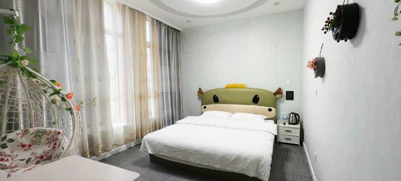 瓦房店雨露主题宾馆图片