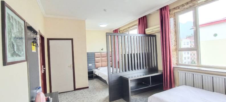 临江贵宾楼阳光99宾馆图片